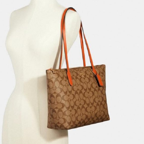 zip top tote in signature canvas